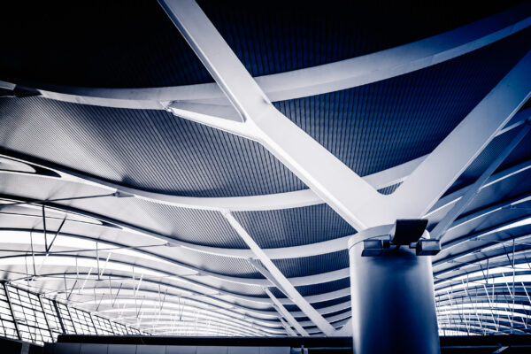 Glass roof of modern building in blue tone.